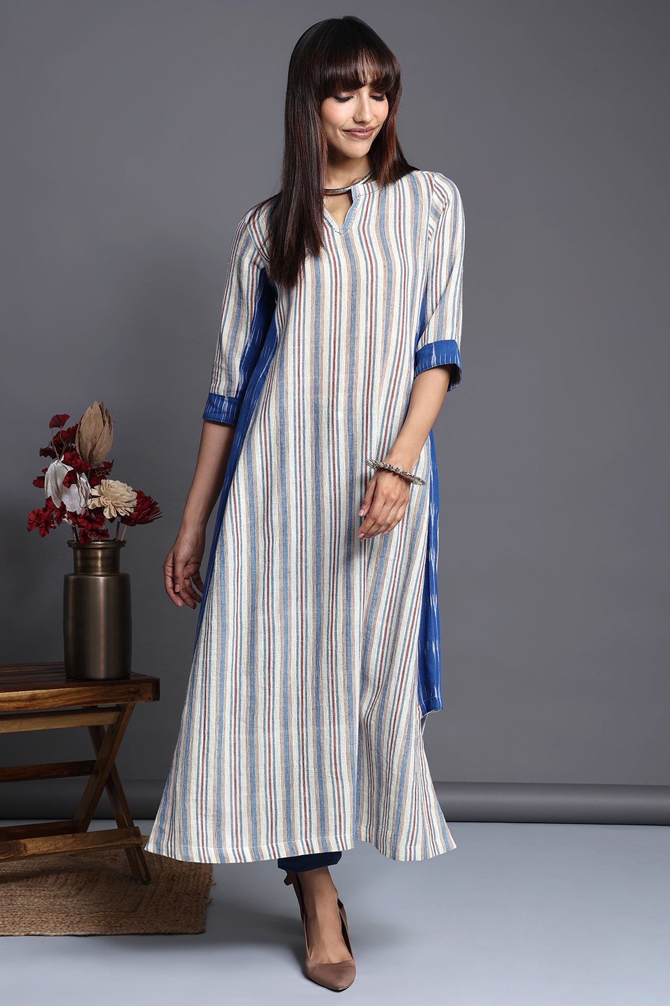 White indigo light red stripes in kala cotton handloom long kurta with a side panel in asymmetric cut in blue ikat 