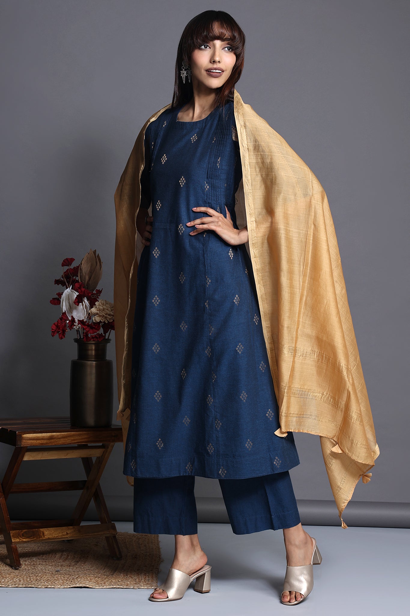 Deep blue gold buta motif south  kurta with side pintucks and blue gold zari sleeve with golden maheshwari dupatta 