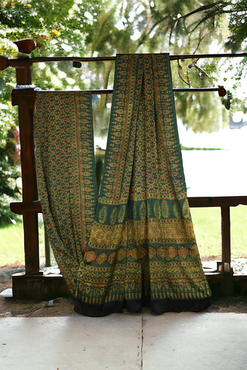 ajrakh modal silk sarees - glistening emerald & gold symphony