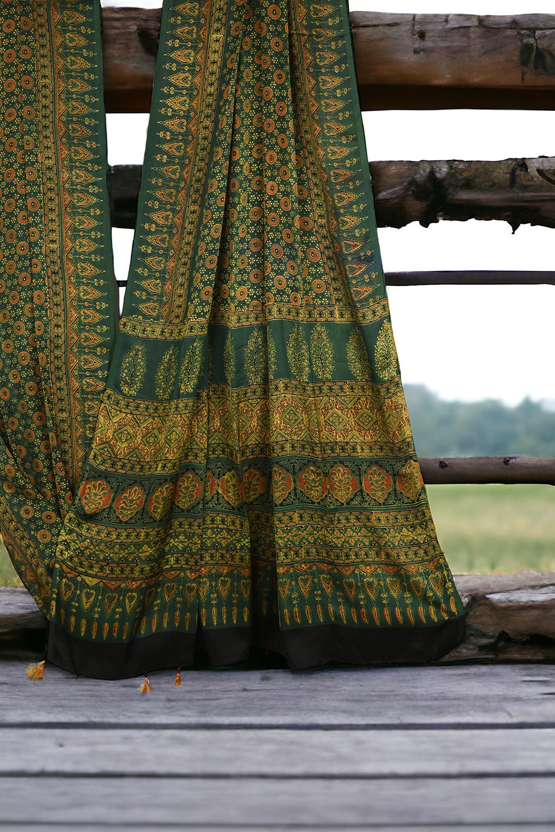 ajrakh modal silk sarees - glistening emerald & gold symphony