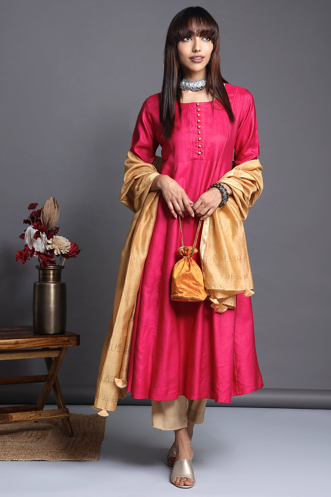 Vibrant Indian Pink silk viscose anarkali with golden buttons and Pockets 