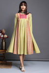 Flared high bust yoke dress with panels and gathers in light green pink checks  handloom handwoven fabric