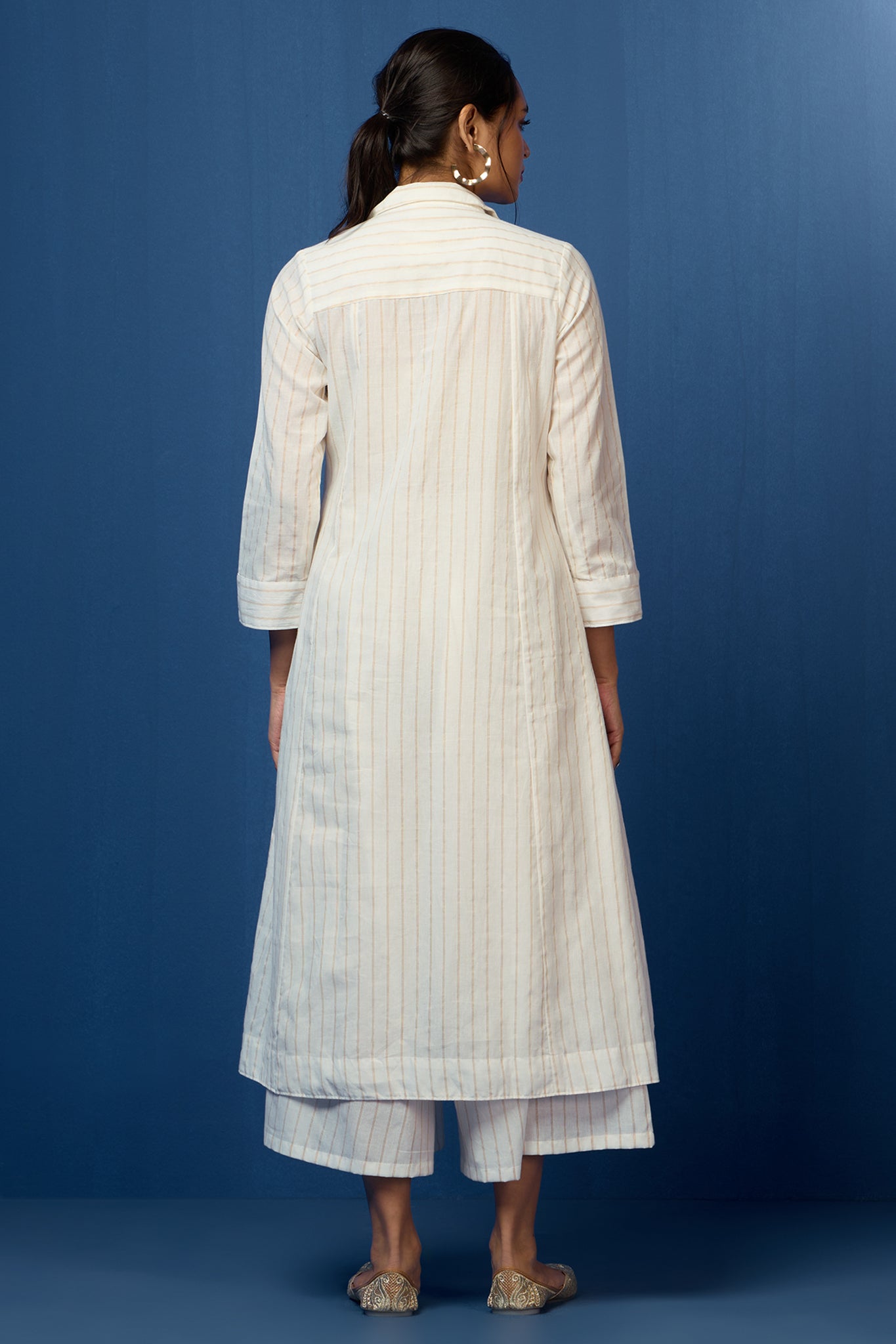 White cotton kurta with  zari lines and buttons 