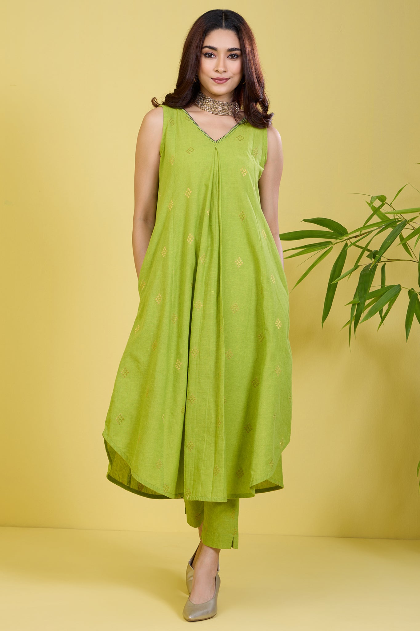 sleeveless lime green co-ord set with box pleat gilded citrus