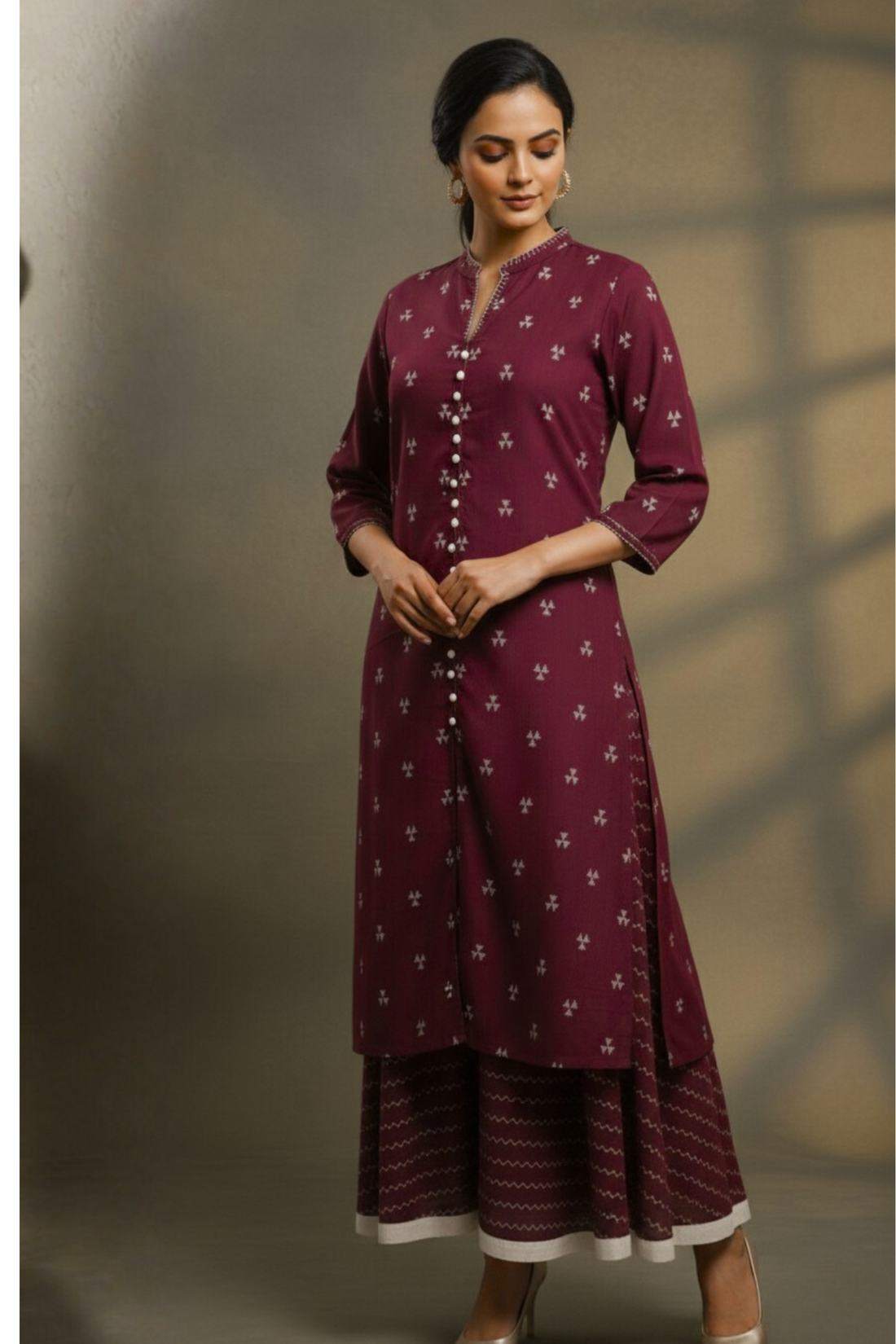 Coord set in maroon with white buti and flared skirt with cream silk trims