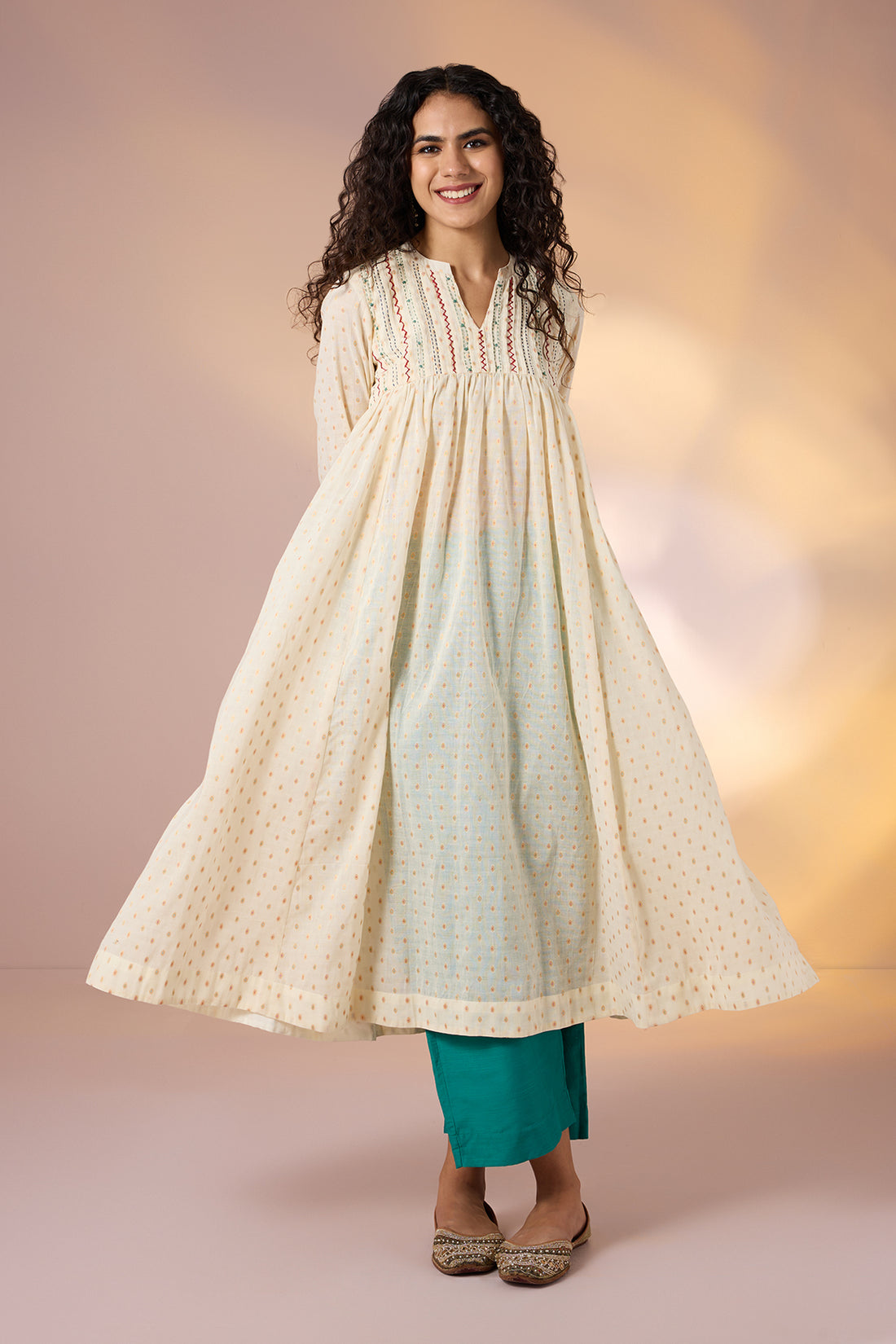 Pintuck Collar High Bust Anarkali In Ivory White Gold Dots And Pockets And Hand Embroidery  by Maati Crafts