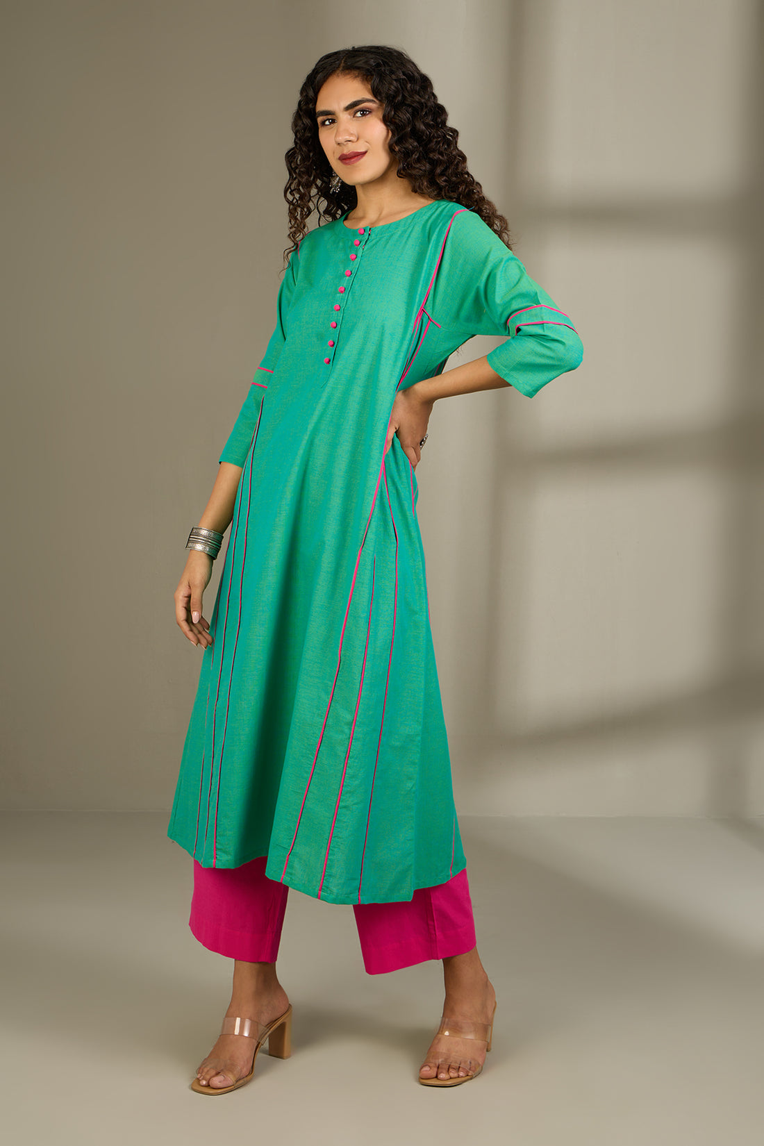 Kalidar Choga Kurta In Turquoise Green And Potli And Pockets  by Maati Crafts