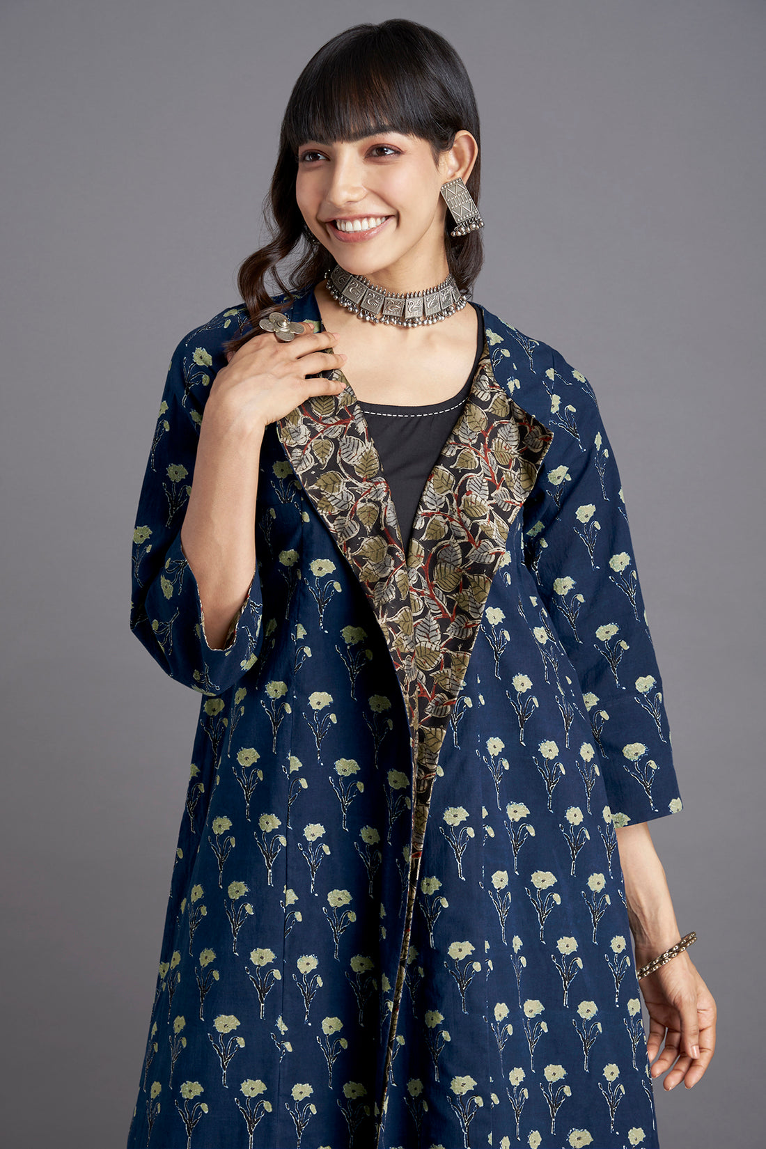 Ajrakh Deep Indigo  Light green Lily Printed Cotton  Long sleevedJacket with  Green black floral lapel and Black Sleeveless Inner and Black Culotte