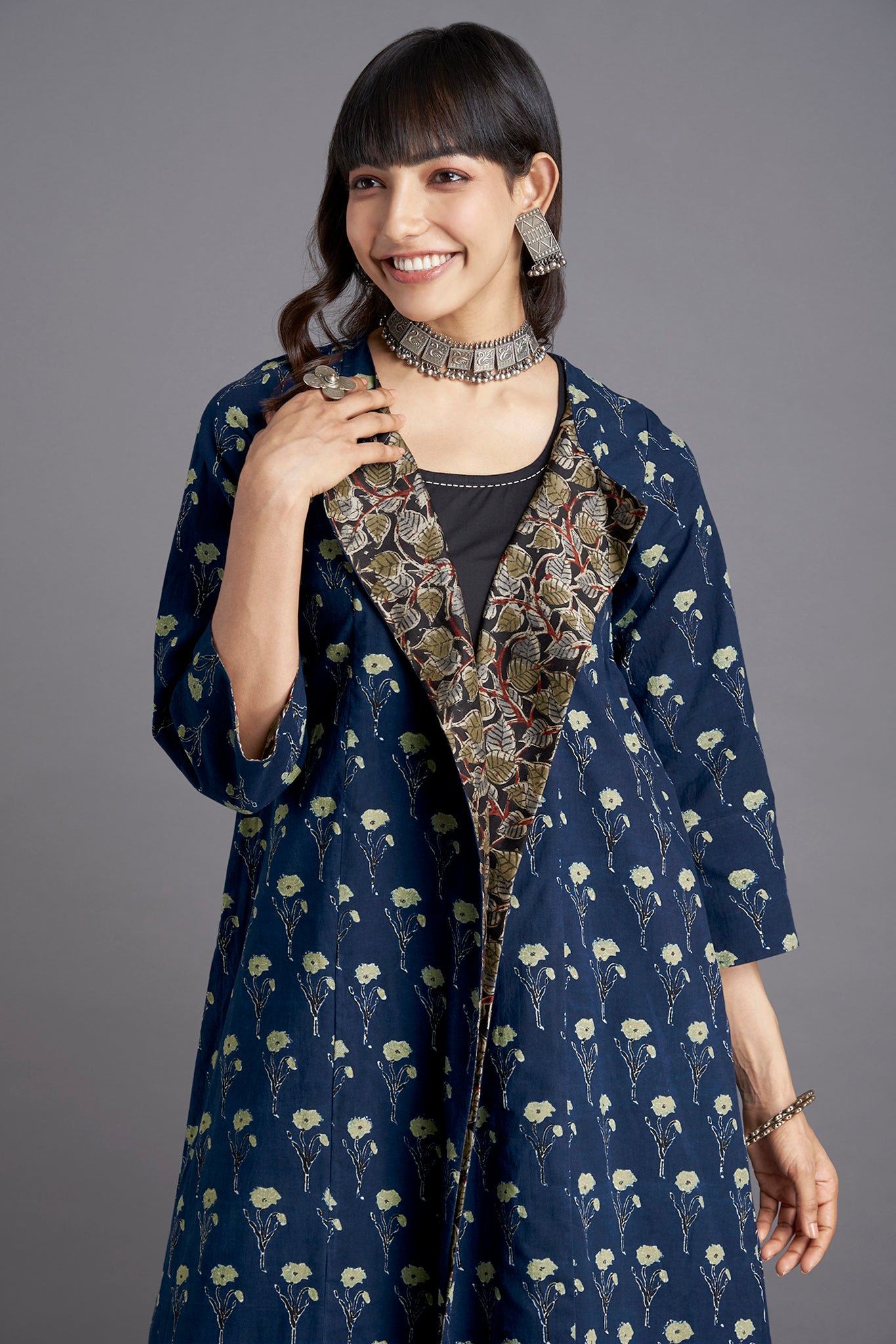 Ajrakh Deep Indigo  Light green Lily Printed Cotton  Long sleevedJacket with  Green black floral lapel and Black Sleeveless Inner and Black Culotte