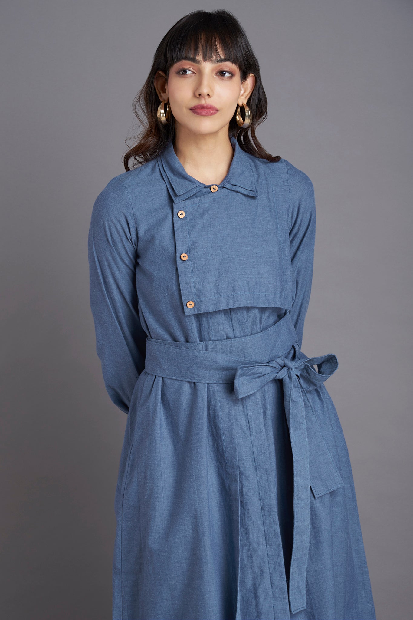 Denim blue south cotton Knee length dress with collar  and front flap with buttons and belt  and side pockets 