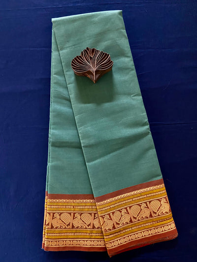 chettinad cotton saree - pastel green & peacock border