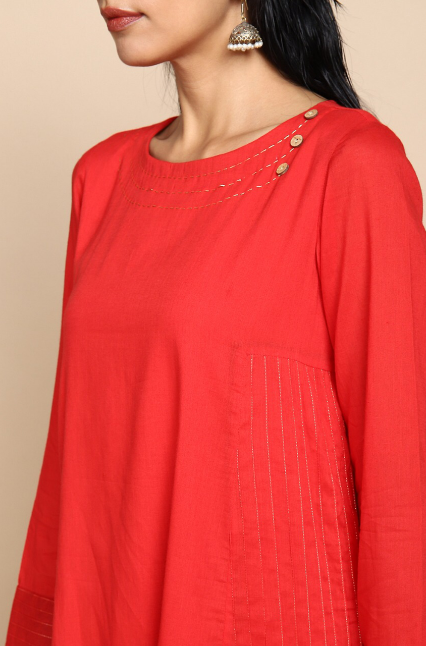 bright red mul kurta with lining with golden embroidery at the neck and wine red indigo ajrakh print straight pants